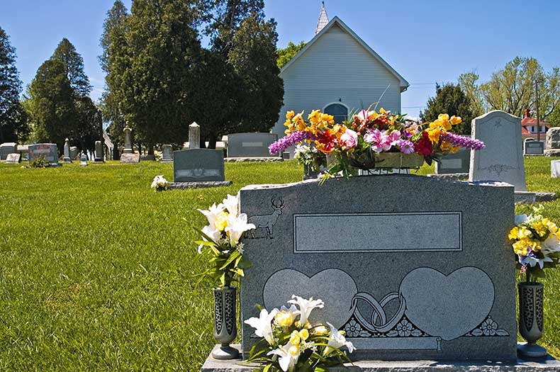 Flowers on gravestone